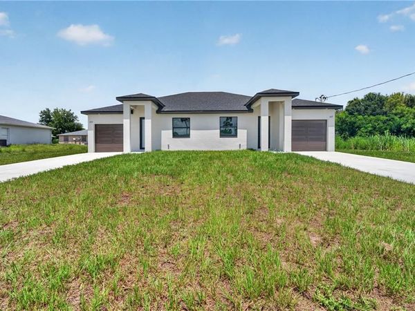 225/227 Ivan AVE S, LEHIGH ACRES, FL 33973