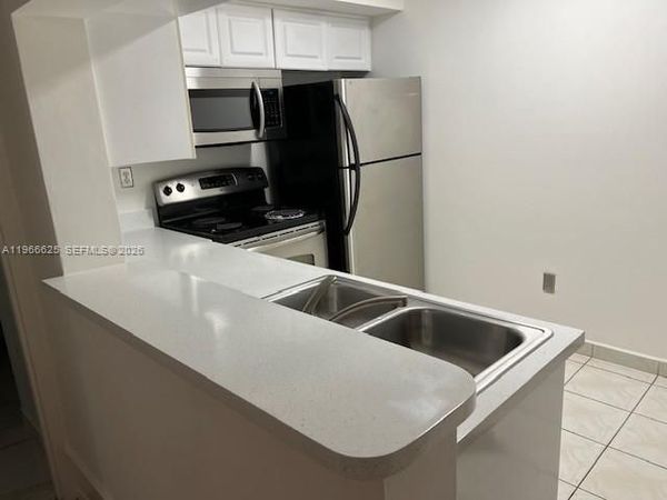 15539 N Miami Lakeway N, Unit 201-22, Miami Lakes, FL 33014