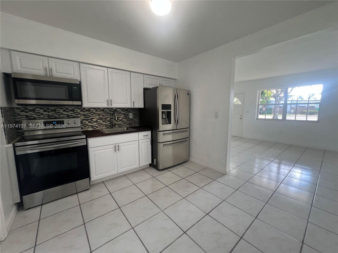5829 NW 37th St , Unit 1, Virginia Gardens, FL 33166 Photo