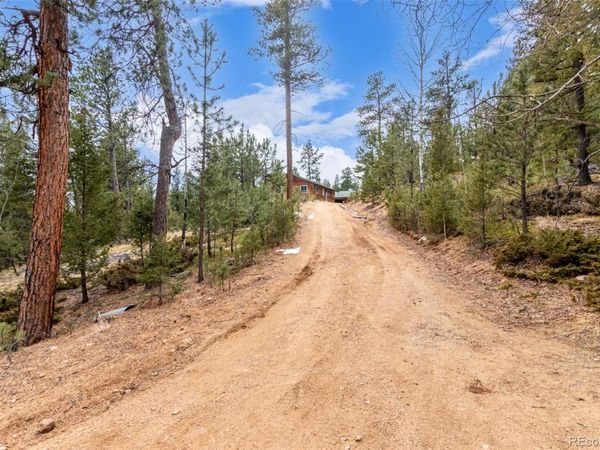 521 Road C , Pine, CO 80470