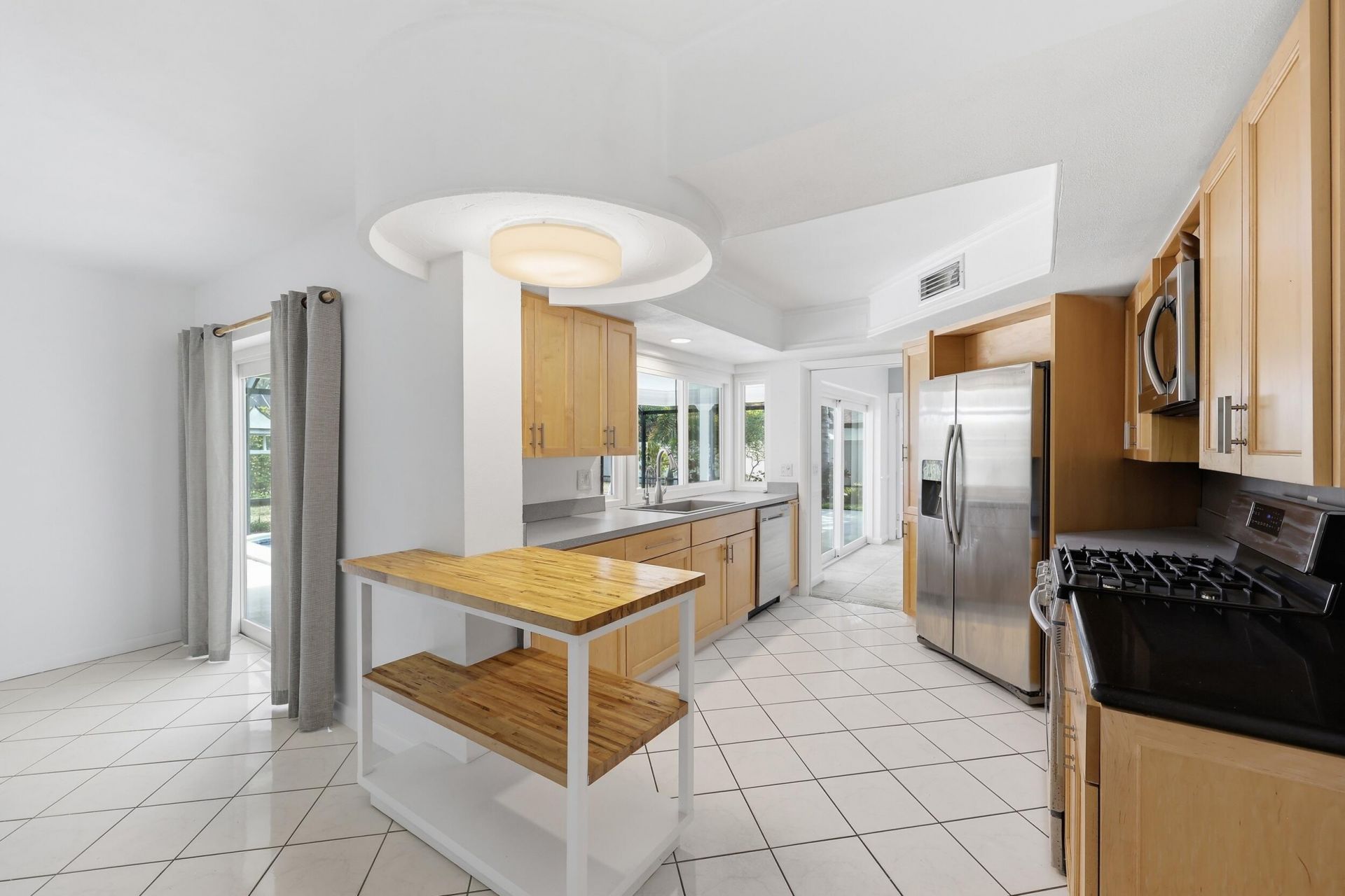 9696 Honeysuckle Avenue, Palm Beach Gardens, FL 33410 Photo