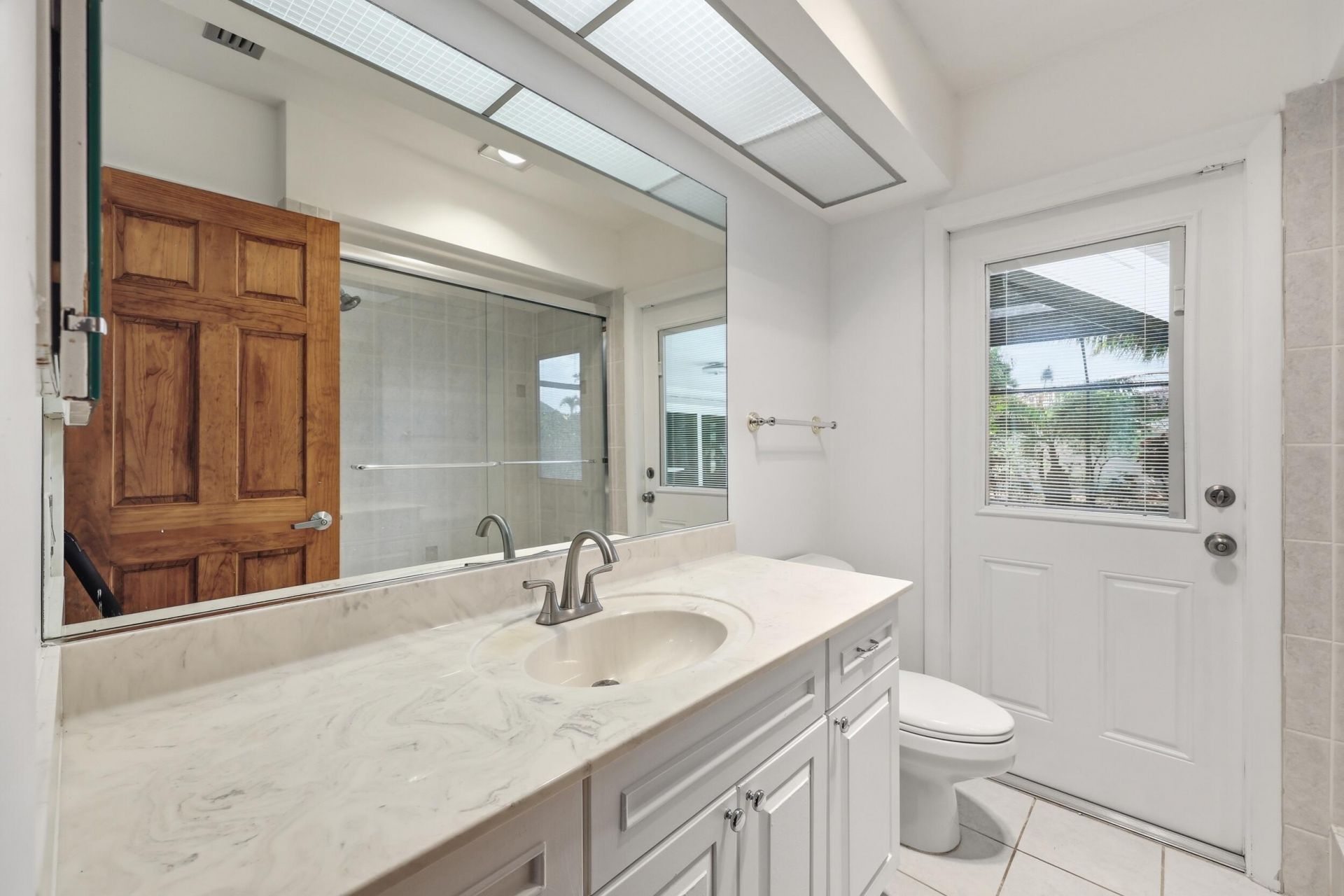 9696 Honeysuckle Avenue, Palm Beach Gardens, FL 33410 Photo