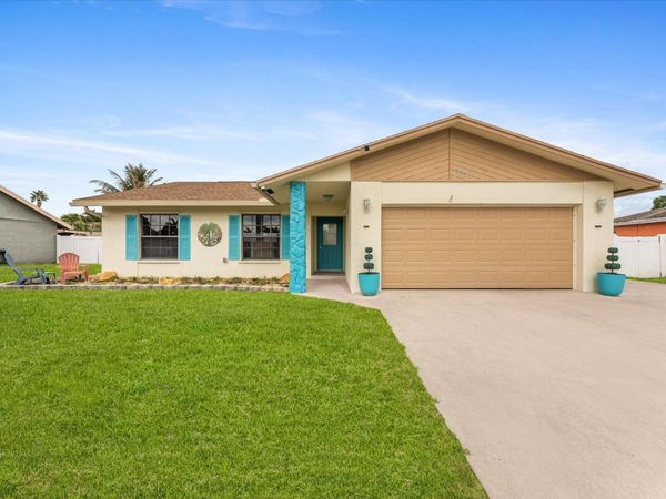 111 Madrid Street, Royal Palm Beach, FL 33411