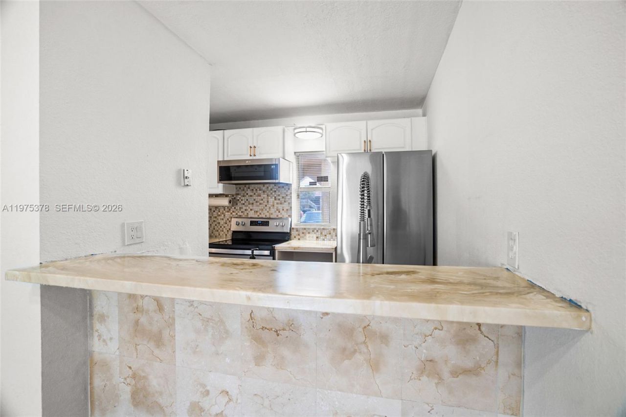 879 Twin Lakes Dr, Unit 1-B, Coral Springs, FL 33071 Photo