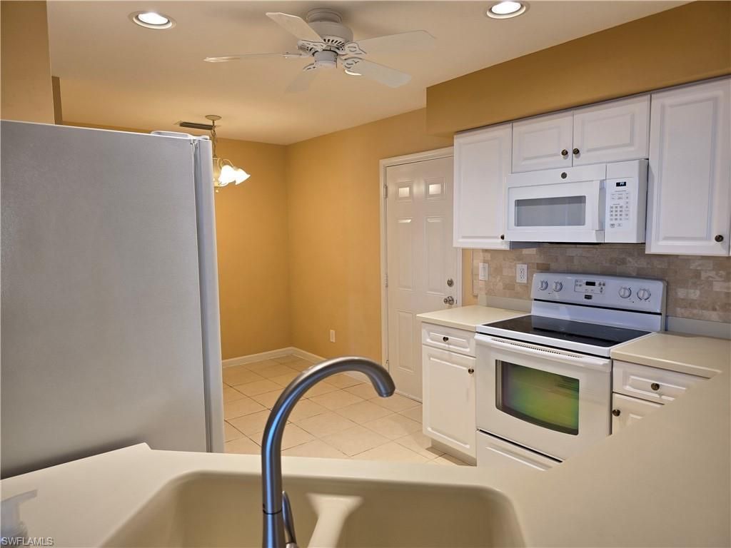 25069 Peacock Ln, Unit 101, Naples, FL 34114 Photo