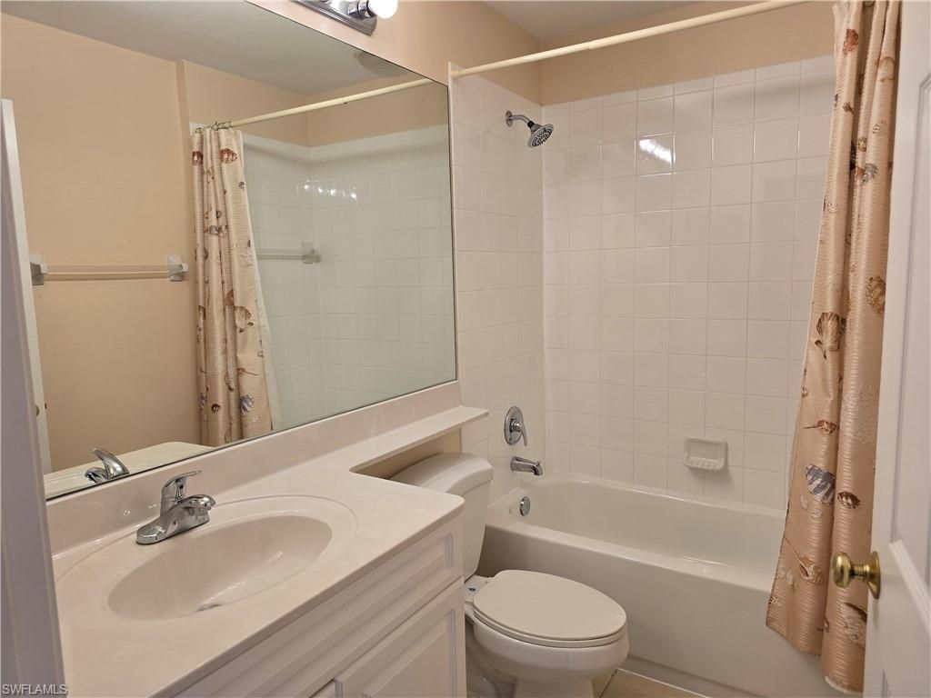 25069 Peacock Ln, Unit 101, Naples, FL 34114 Photo