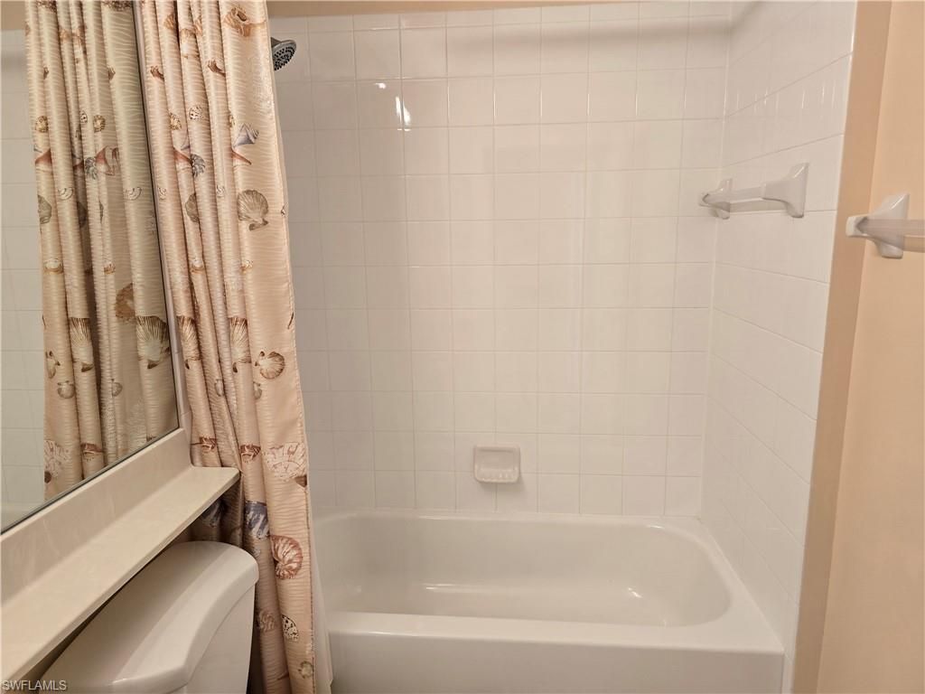 25069 Peacock Ln, Unit 101, Naples, FL 34114 Photo