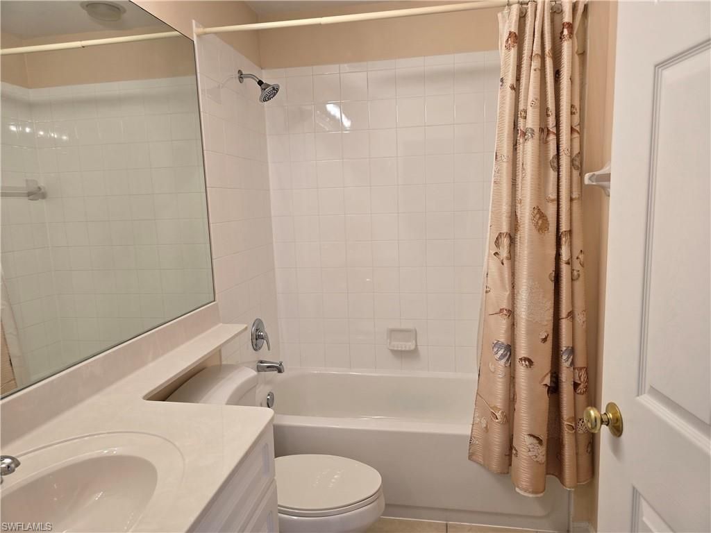 25069 Peacock Ln, Unit 101, Naples, FL 34114 Photo