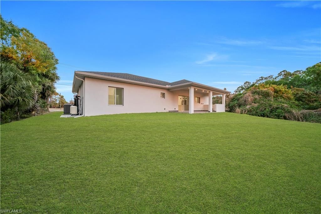 128 Bell Blvd S, Lehigh Acres, FL 33974 Photo
