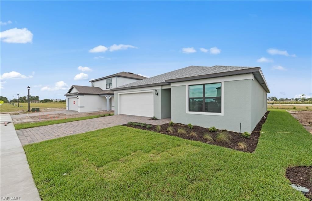 609 Oasis Lake Pl, Lehigh Acres, FL 33936 Photo