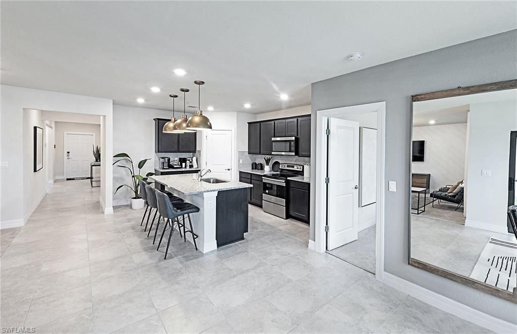 609 Oasis Lake Pl , Lehigh Acres, FL 33936 Photo