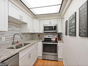 7651 TREMAYNE PLACE , Unit 211, MCLEAN, VA 22102