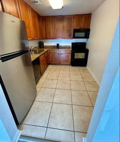 4114 Dijon Drive , Unit 4114E, Orlando, FL 32808 Photo