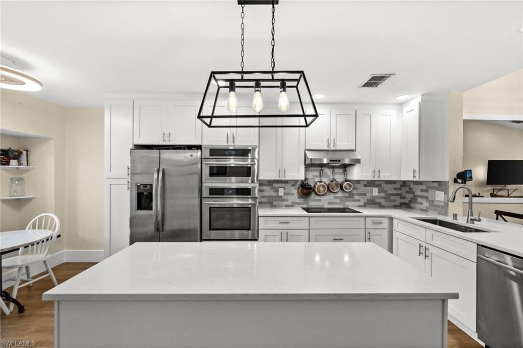 7595 Meadow Lakes Dr , Unit 502, Naples, FL 34104 Photo