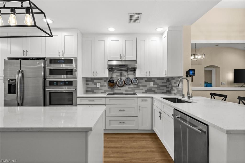 7595 Meadow Lakes Dr , Unit 502, Naples, FL 34104 Photo