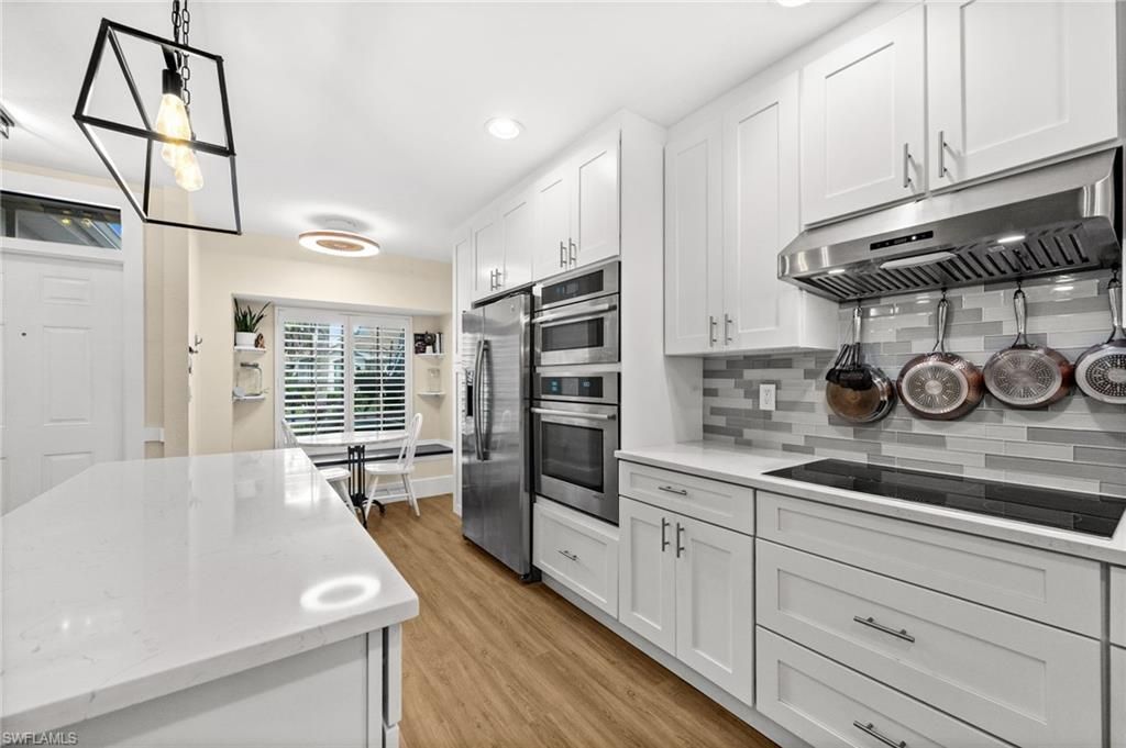 7595 Meadow Lakes Dr , Unit 502, Naples, FL 34104 Photo