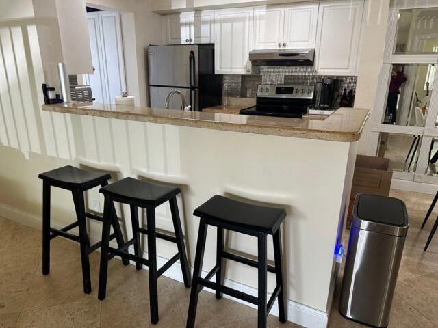 160 Yacht Club Way, Unit 212, Hypoluxo, FL 33462 Photo