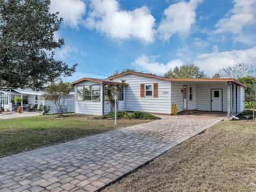 1404 PLANTATION DRIVE, LADY LAKE, FL 32159