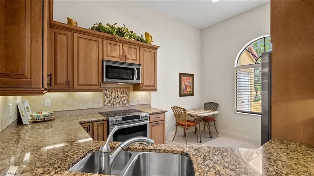 577 Beachwalk Cir, Unit R202, Naples, FL 34108 Photo