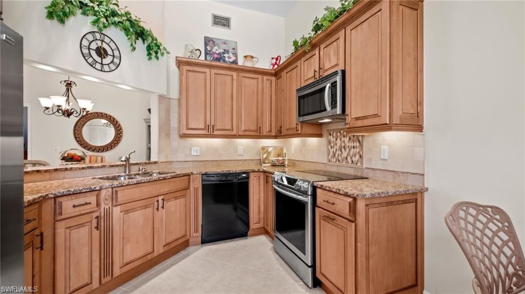 577 Beachwalk Cir, Unit R202, Naples, FL 34108 Photo