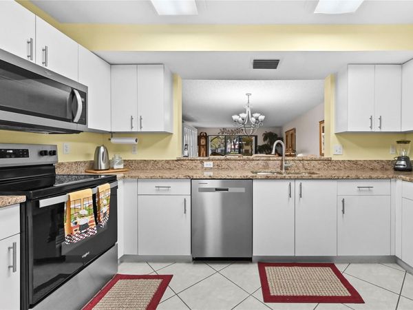 9716 Sills Drive, Unit 103, Boynton Beach, FL 33437