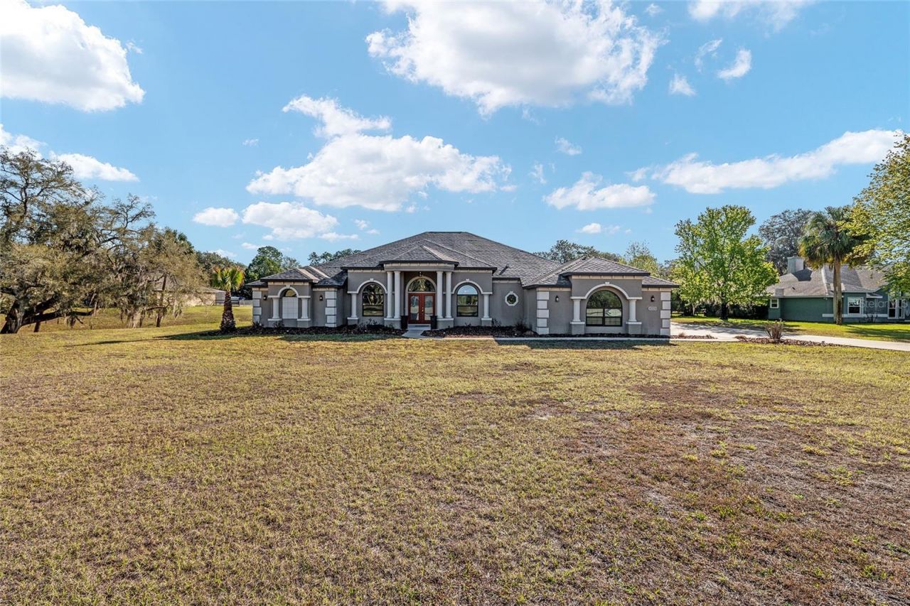 7015 NE 61st Avenue Road , Silver Springs, FL 34488 Photo