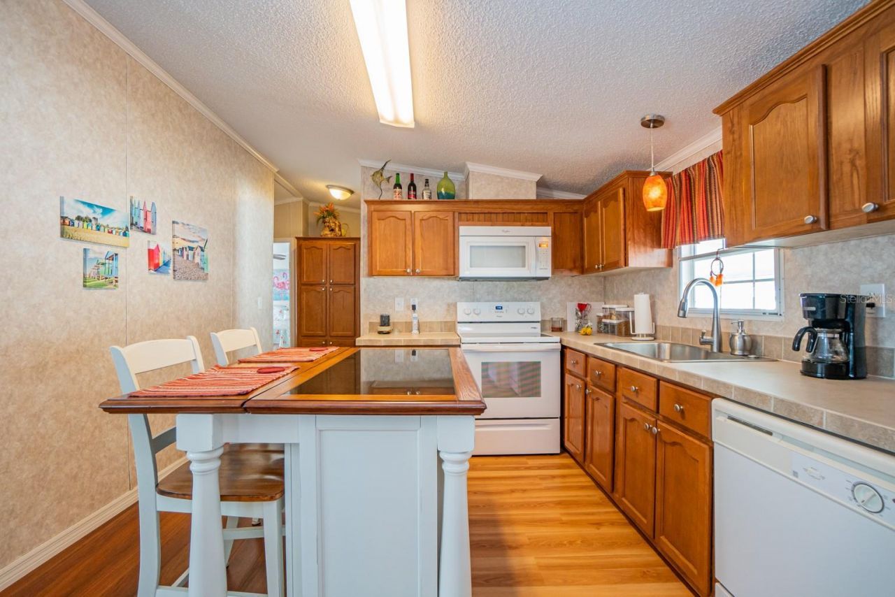 10303 Burnt Store Road , Unit 203, Punta Gorda, FL 33950 Photo