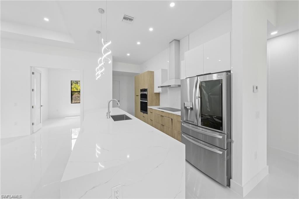 303 Mcarthur Ave , Lehigh Acres, FL 33936 Photo