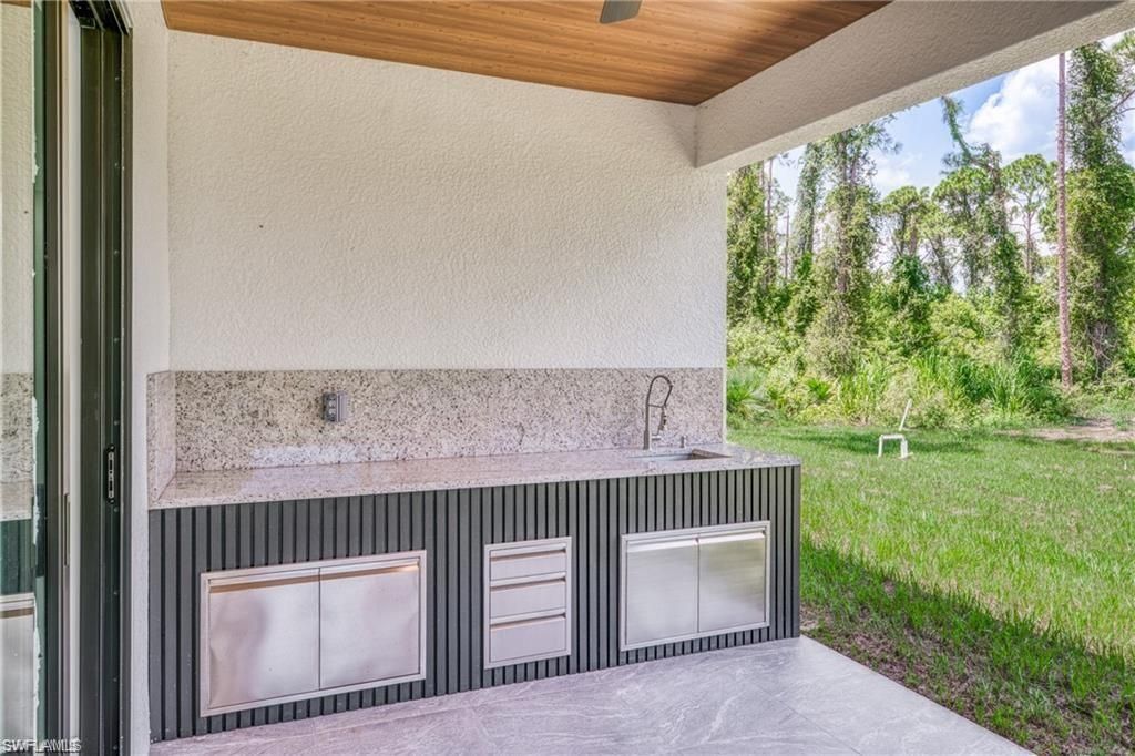 303 Mcarthur Ave , Lehigh Acres, FL 33936 Photo