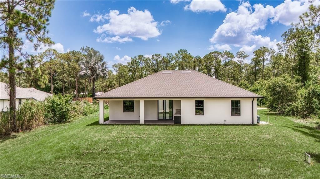 303 Mcarthur Ave , Lehigh Acres, FL 33936 Photo