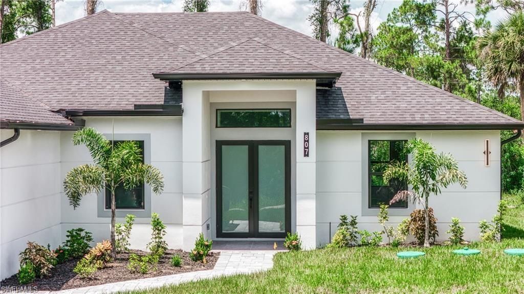 303 Mcarthur Ave , Lehigh Acres, FL 33936 Photo