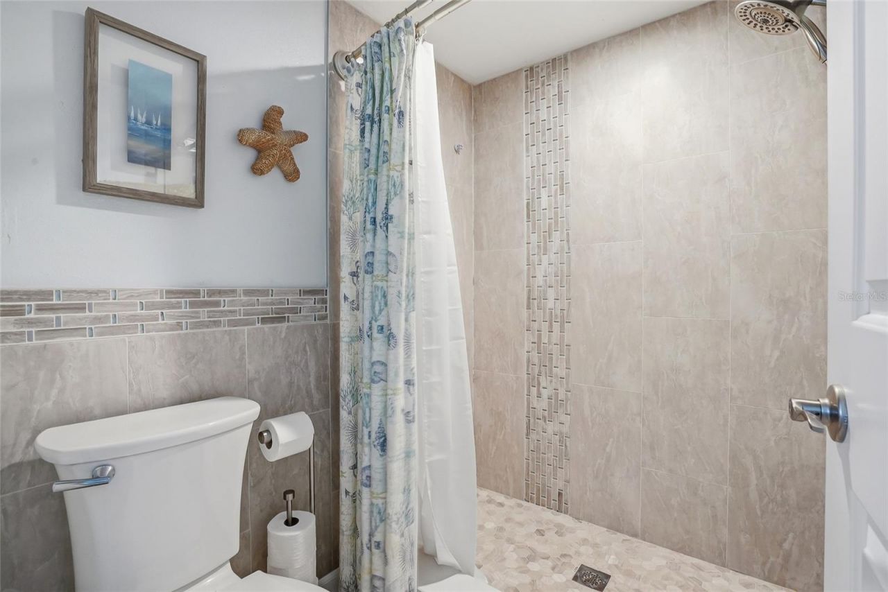 11901 Lagoon Lane , Unit 303, Treasure Island, FL 33706 Photo