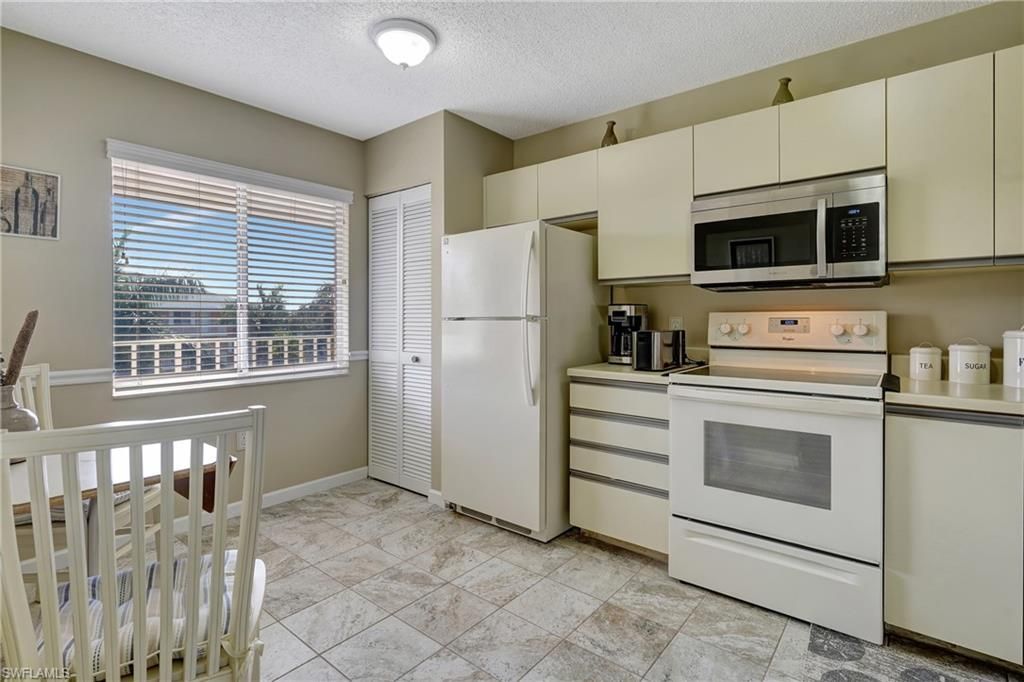 3062 Sandpiper Bay Cir, Unit K302, Naples, FL 34112 Photo