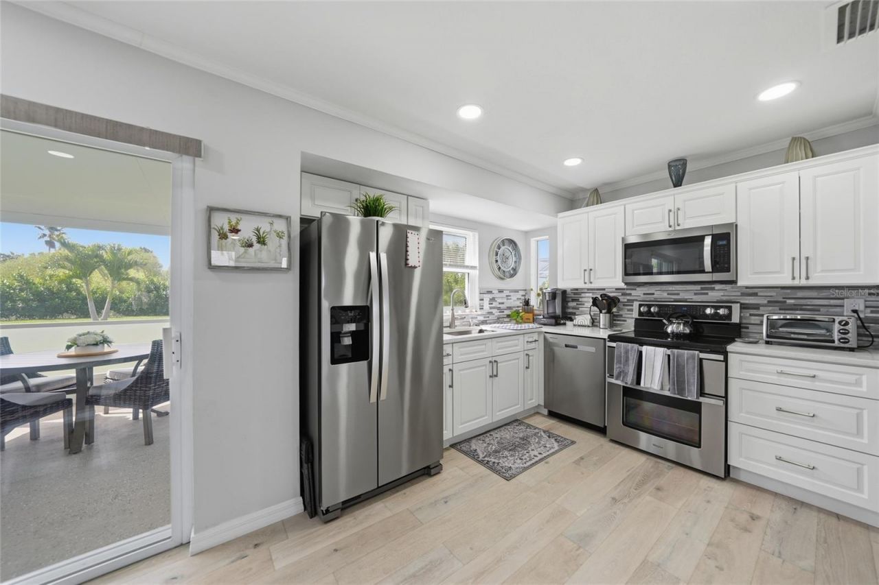 1120 SE 23rd Terrace , Cape Coral, FL 33990 Photo