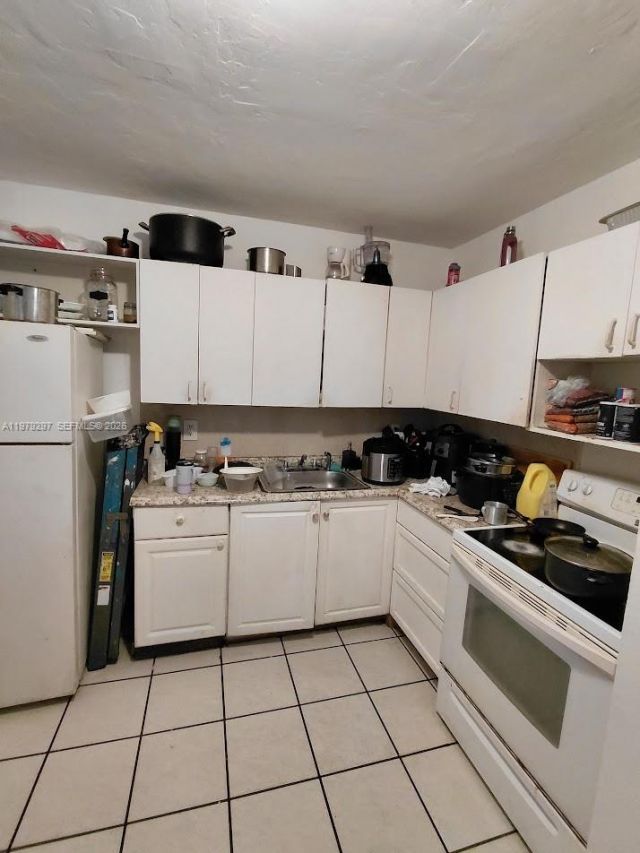 1262 NW 46th St , Miami, FL 33142 Photo