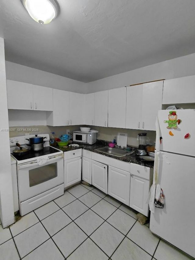 1262 NW 46th St , Miami, FL 33142 Photo