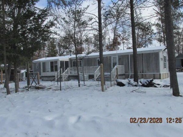 8990 S Crosby Road, Idlewild, MI 49642