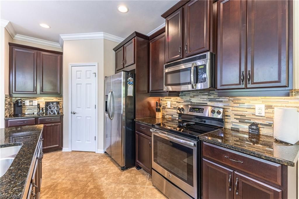 23550 Alamanda Dr, Unit 203, Estero, FL 34135 Photo