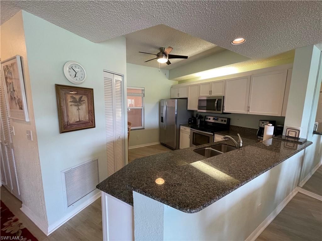 1070 Woodshire Ln, Unit E204, Naples, FL 34105 Photo