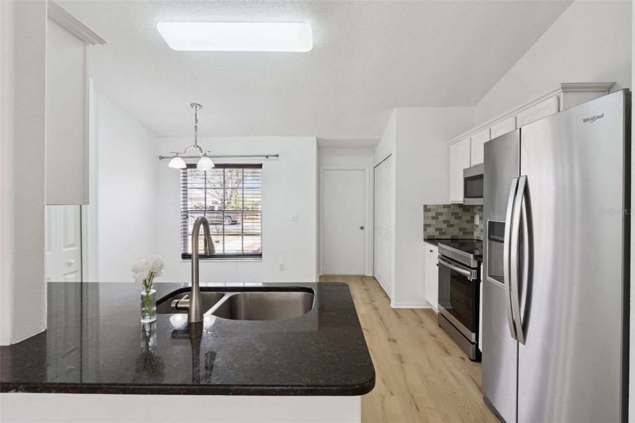 13808 Riverpath Grove Drive, Orlando, FL 32826 Photo