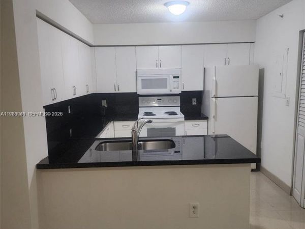 4560 NW 107th Ave, Unit 207-12, Doral, FL 33178