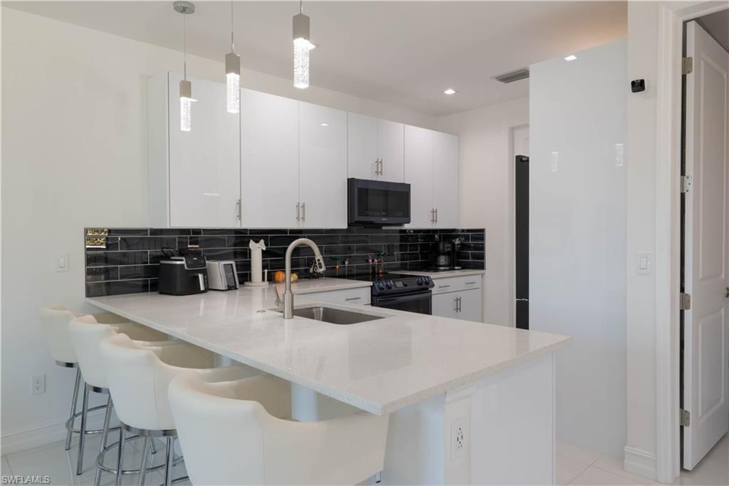 7510 Rockefeller Dr , Naples, FL 34119 Photo