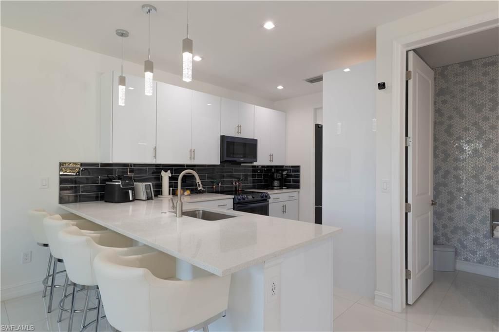 7510 Rockefeller Dr , Naples, FL 34119 Photo