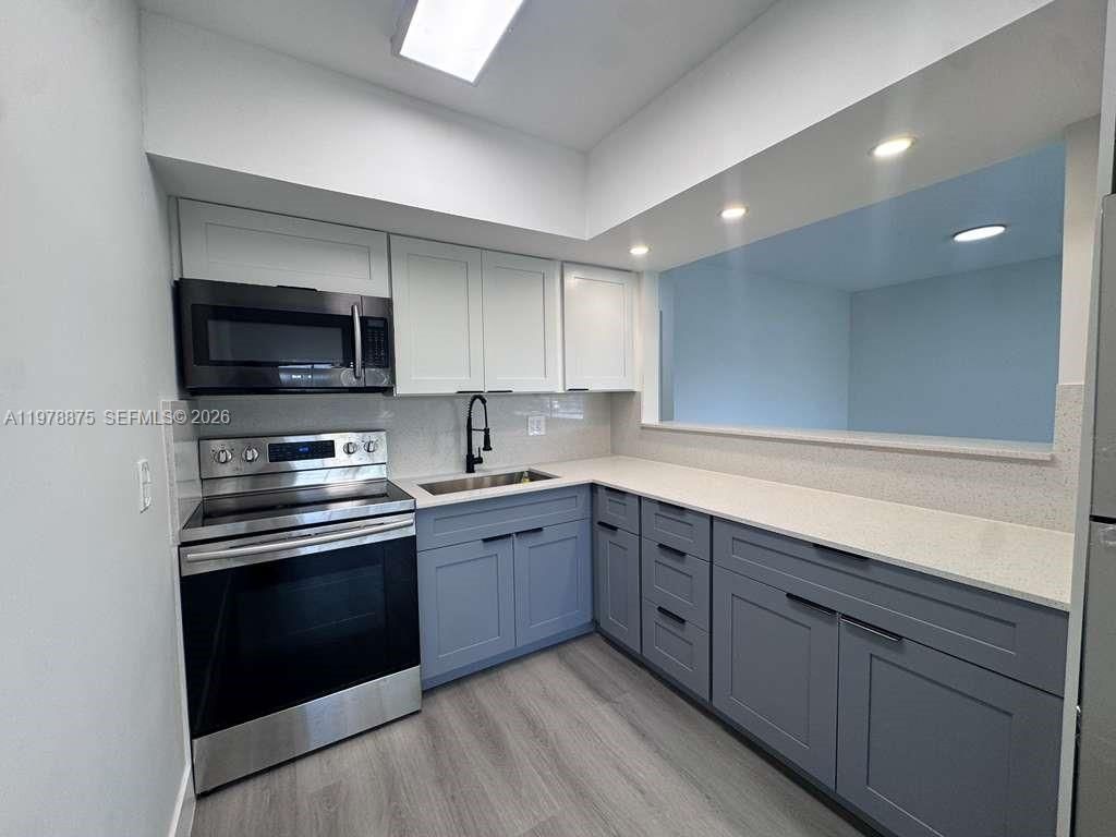 455 Golden Isles Dr, Unit 203, Hallandale Beach, FL 33009 Photo