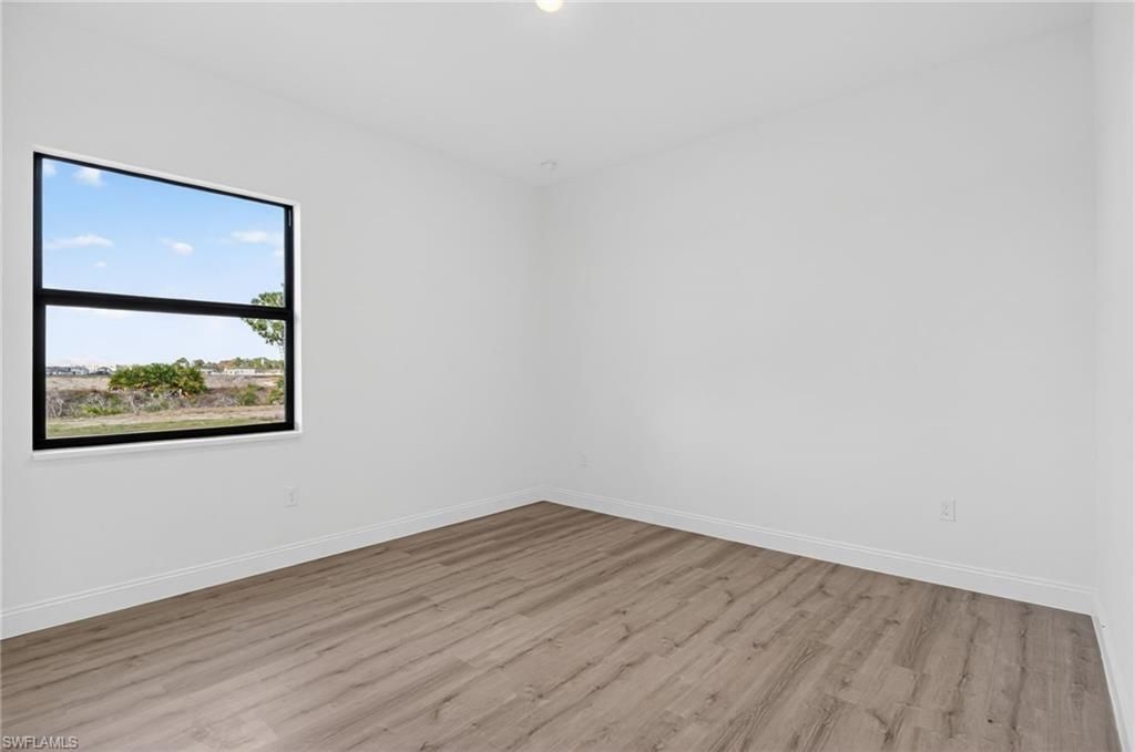 633 Cane St E, Lehigh Acres, FL 33974 Photo