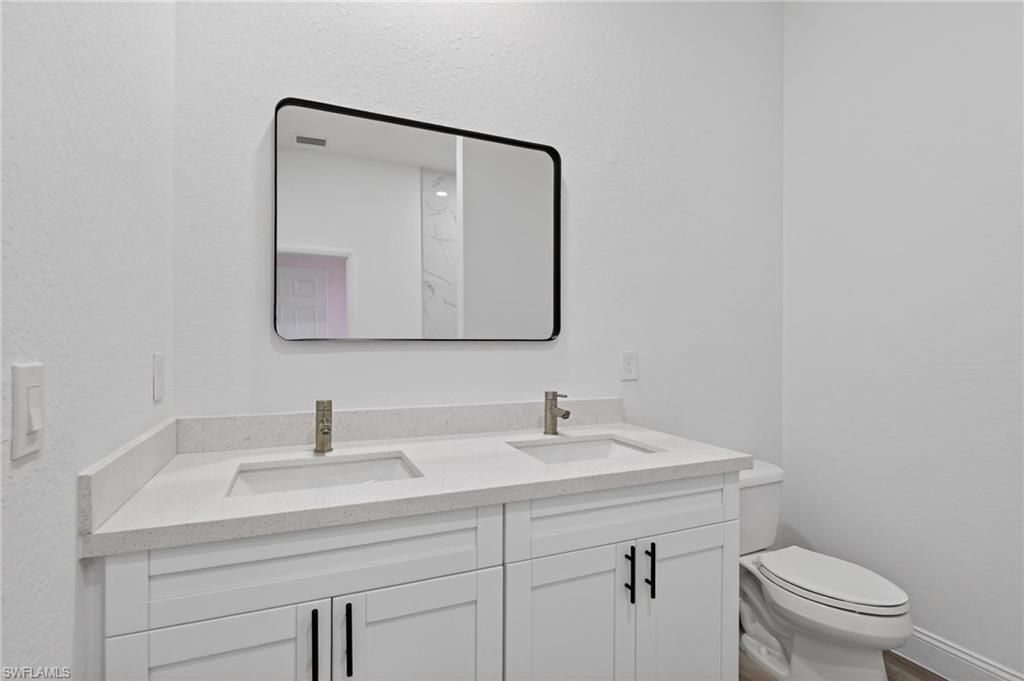 633 Cane St E, Lehigh Acres, FL 33974 Photo