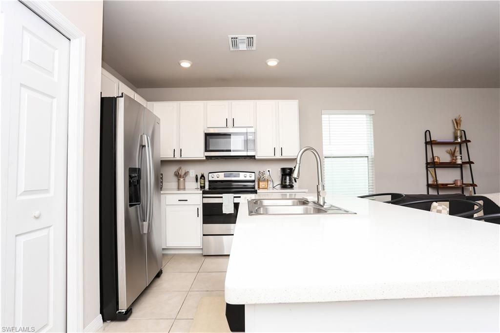 15026 Wildflower Cir , Naples, FL 34119 Photo