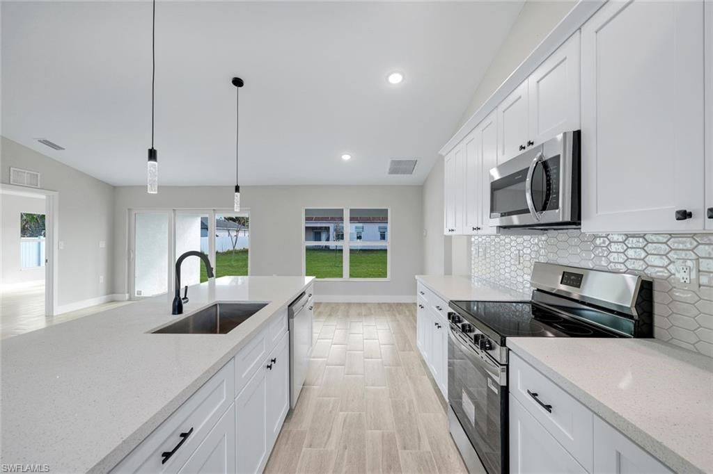 1105 NW 21st Ave, Cape Coral, FL 33993 Photo