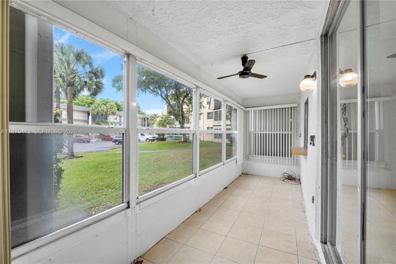9091 Lime Bay Blvd , Unit 110, Tamarac, FL 33321 Photo