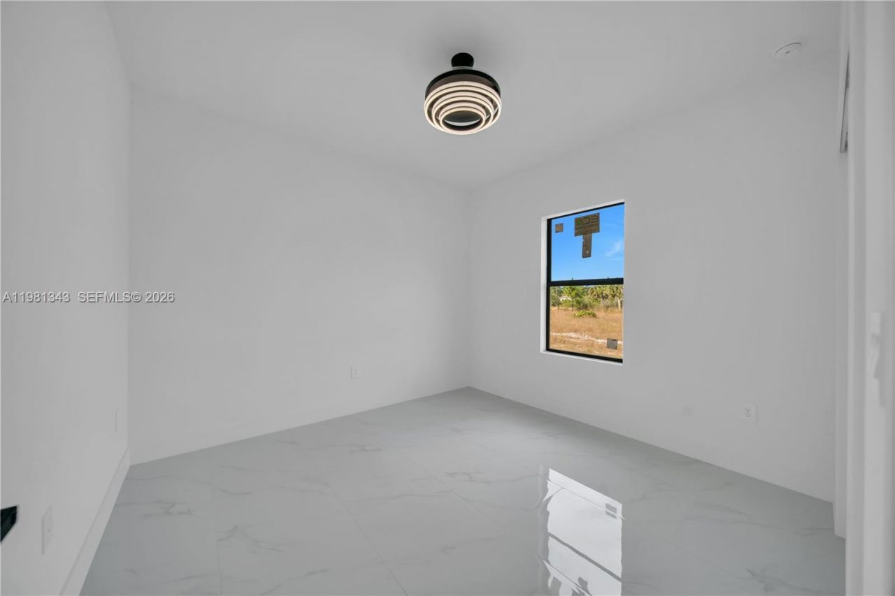704 Holmes Ave, Lehigh Acres, FL 33974 Photo